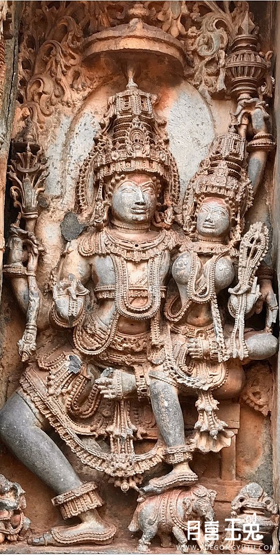 545px-12th-century_Vedic_Indra_and_Indrani_at_Shaivism_Hindu_temple_Hoysaleswara.jpg